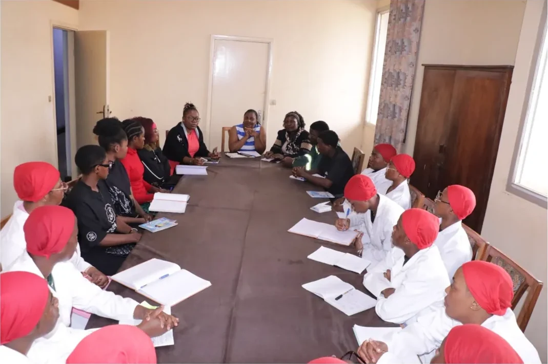 A community group gathered around a working table
